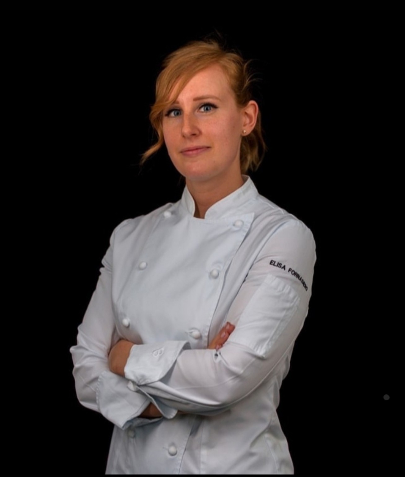 Ritratto di Elisa Fornasiero in giacca da pasticcera